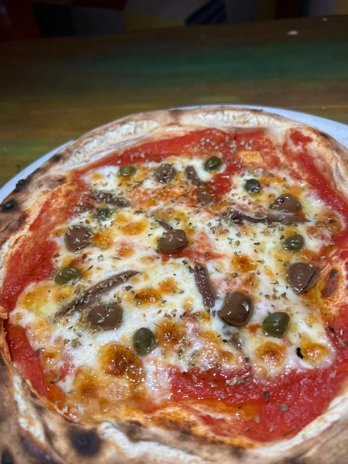 Authentic Artisan Pizza with Anchovies and Capers at El Momento Jávea